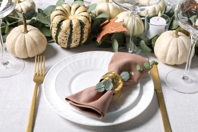 Photo of Beautiful autumn table setting with floral decor