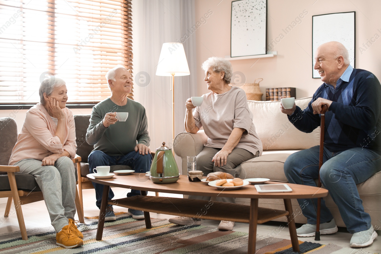 Photo of Elderly people spending time in geriatric hospice. Senior patients care