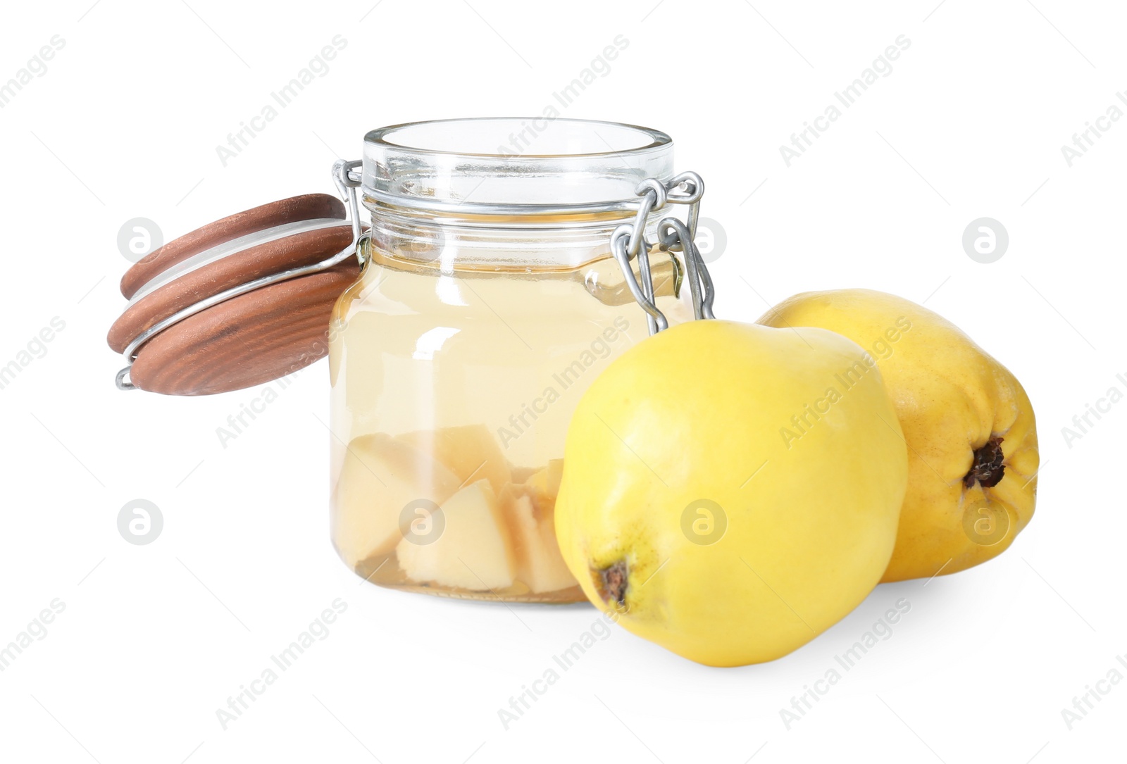 Photo of Delicious quince drink in glass jar and fresh fruits isolated on white