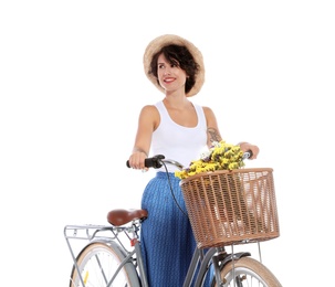 Portrait of beautiful young woman with bicycle on white background