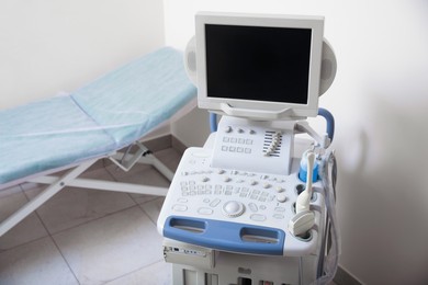 Ultrasound machine and examination table in hospital, above view