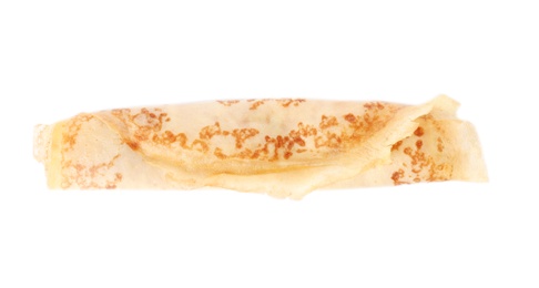 Tasty thin pancake roll on white background, top view