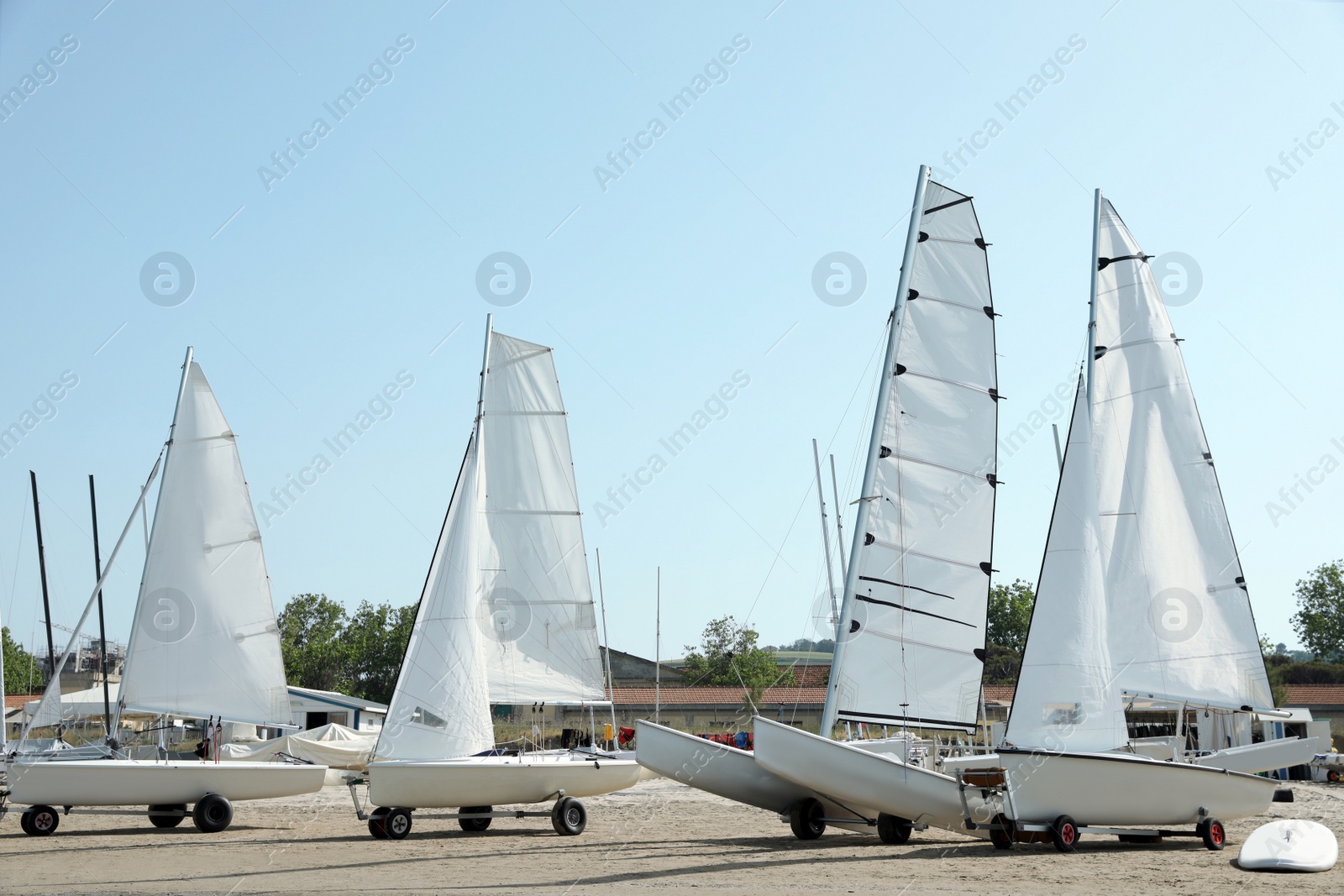 Photo of Seacoast with modern boats on sunny day