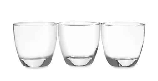 Photo of New clean empty glasses isolated on white