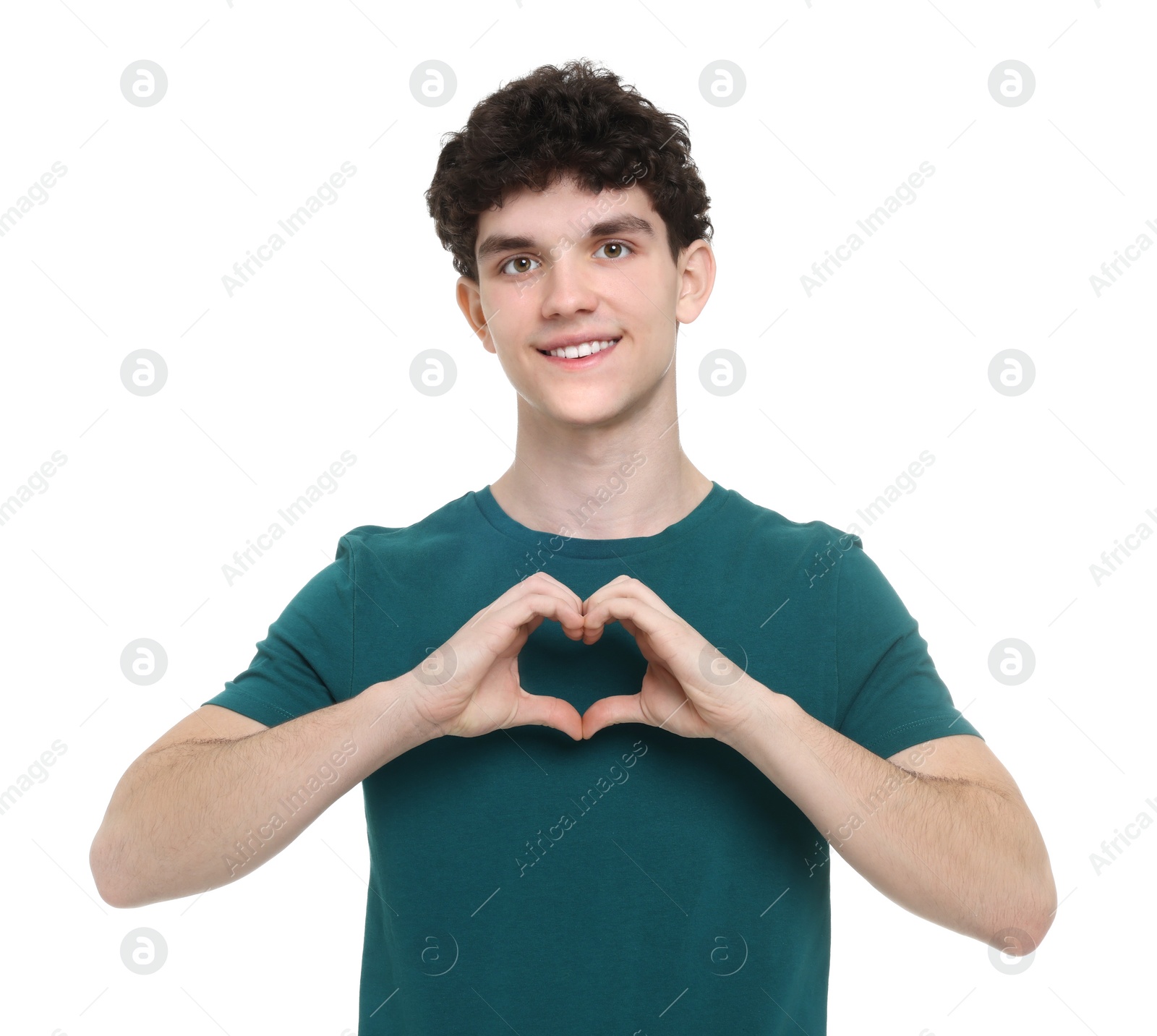 Photo of Happy young man showing heart gesture with hands on white background