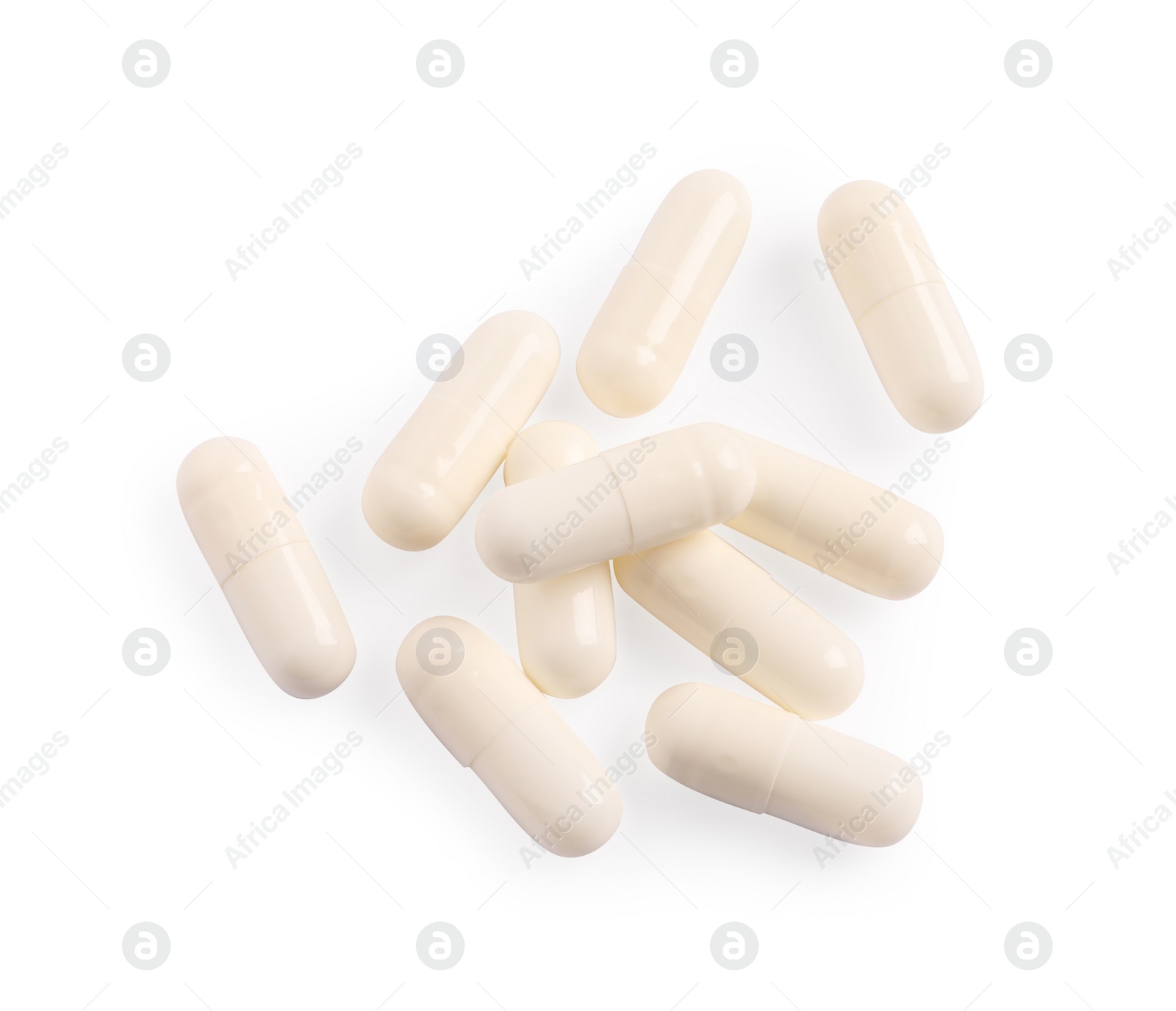 Photo of Many pills isolated on white, top view