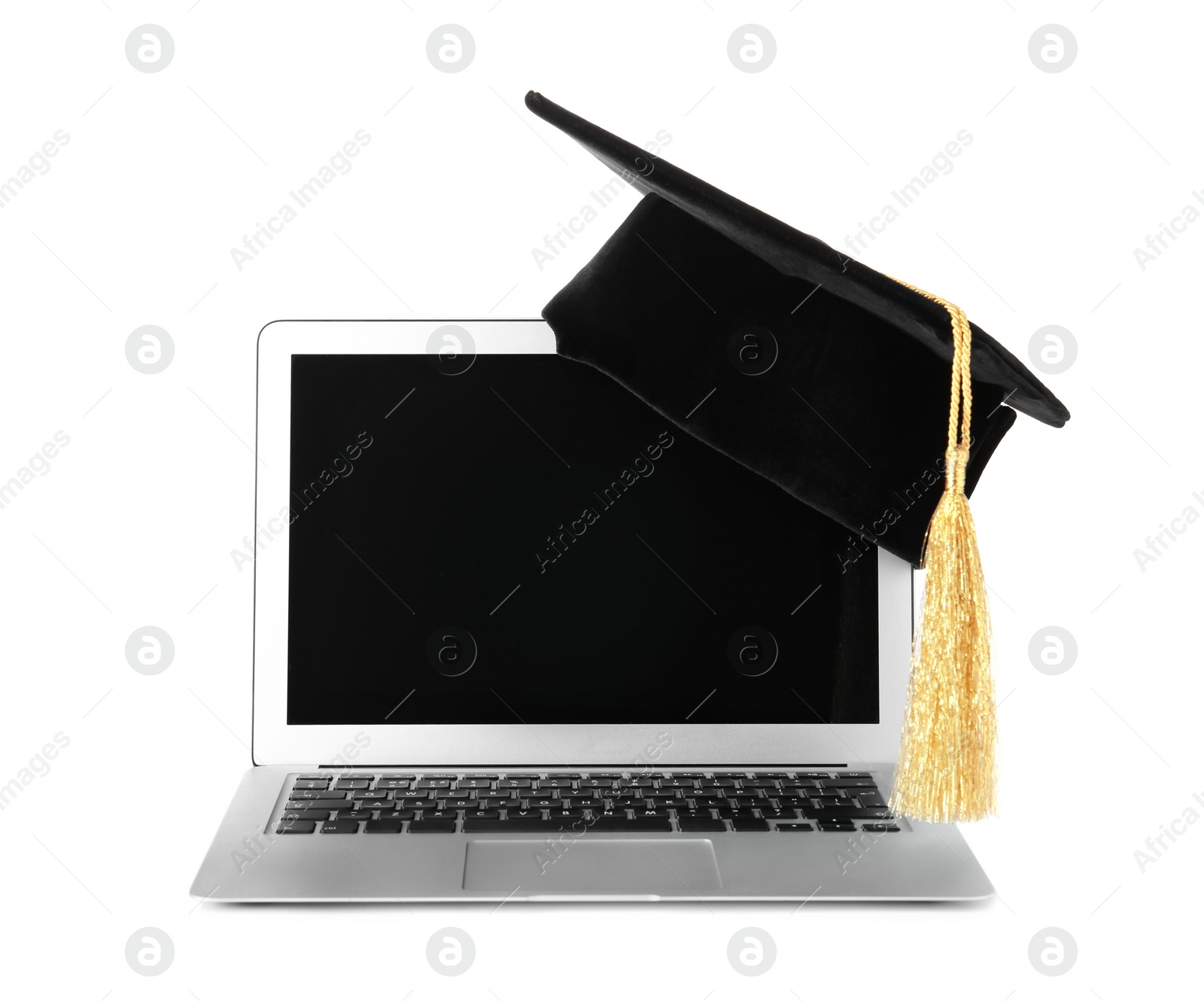 Photo of Graduation hat with gold tassel and laptop isolated on white. Space for text