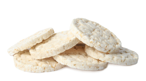 Photo of Pile of crunchy rice cakes isolated on white