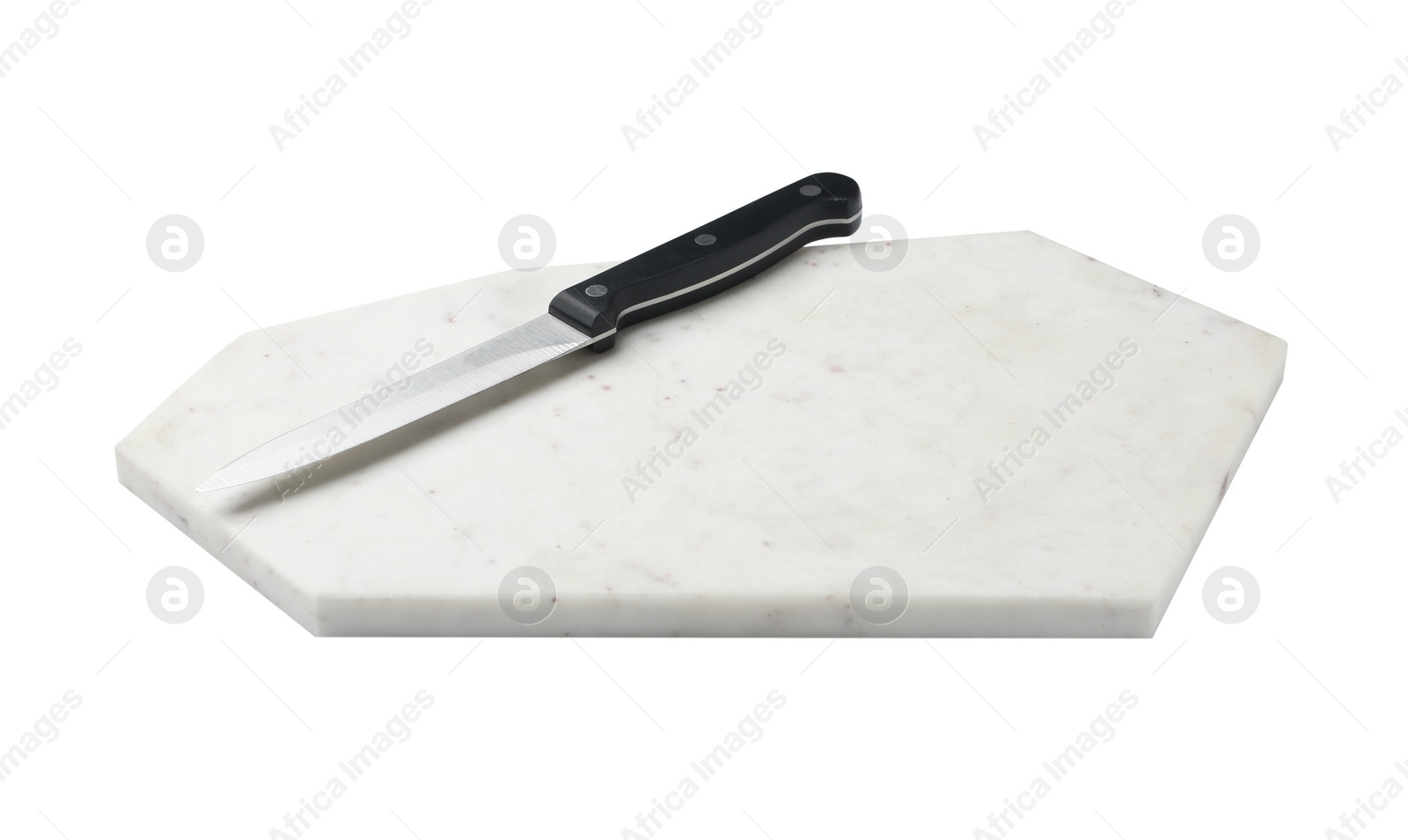 Photo of Utility knife and marble board on white background