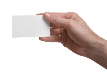 Photo of Man holding blank business card on white background, closeup