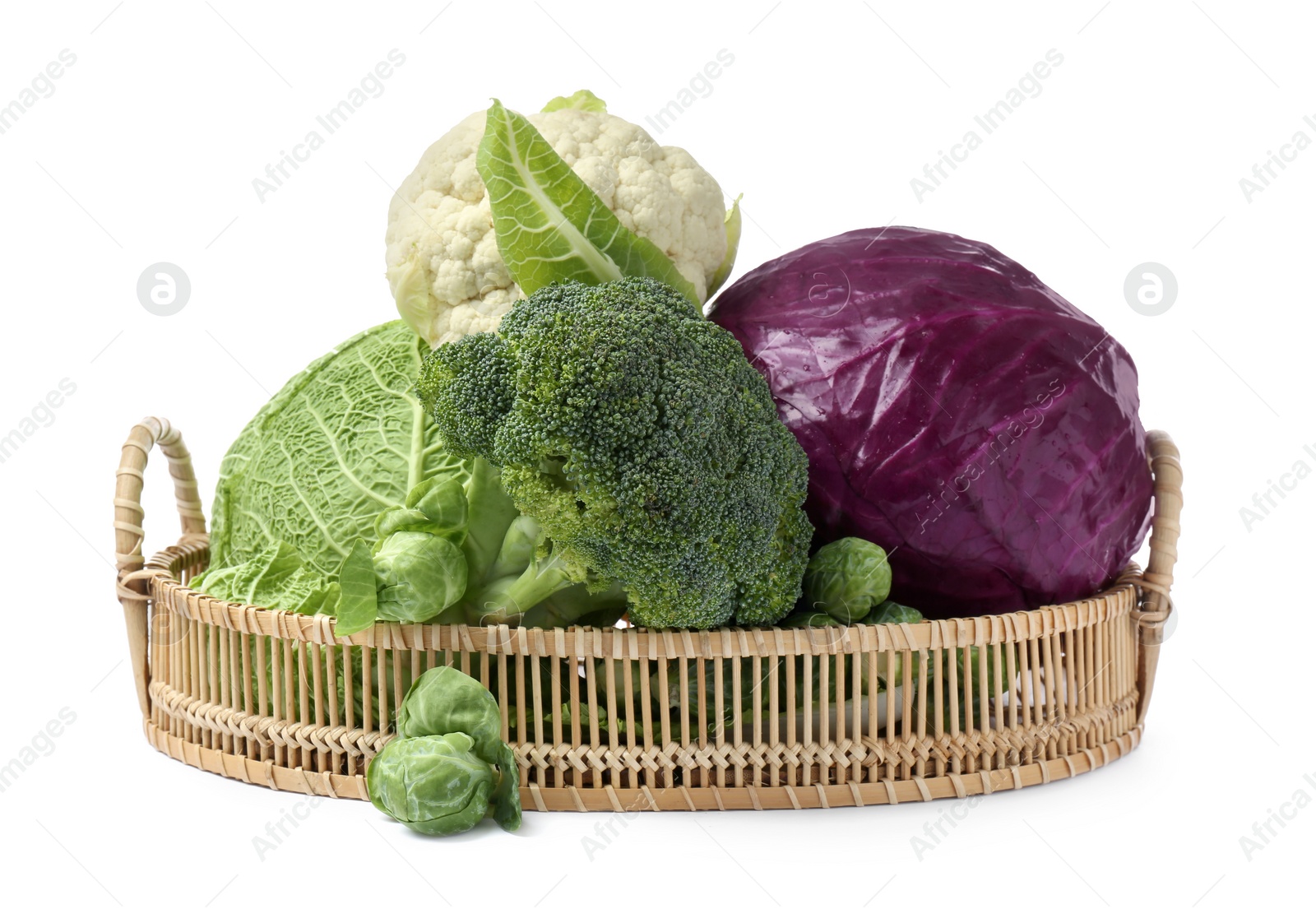 Photo of Wicker tray with different types of fresh cabbage on white background