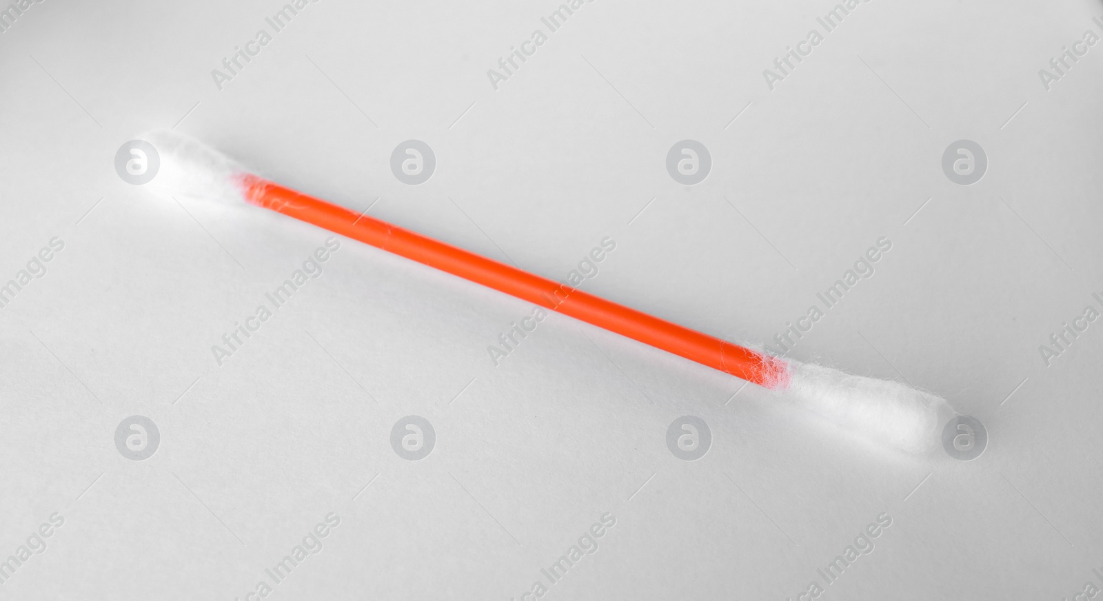 Photo of Clean cotton bud isolated on white. Hygienic accessory