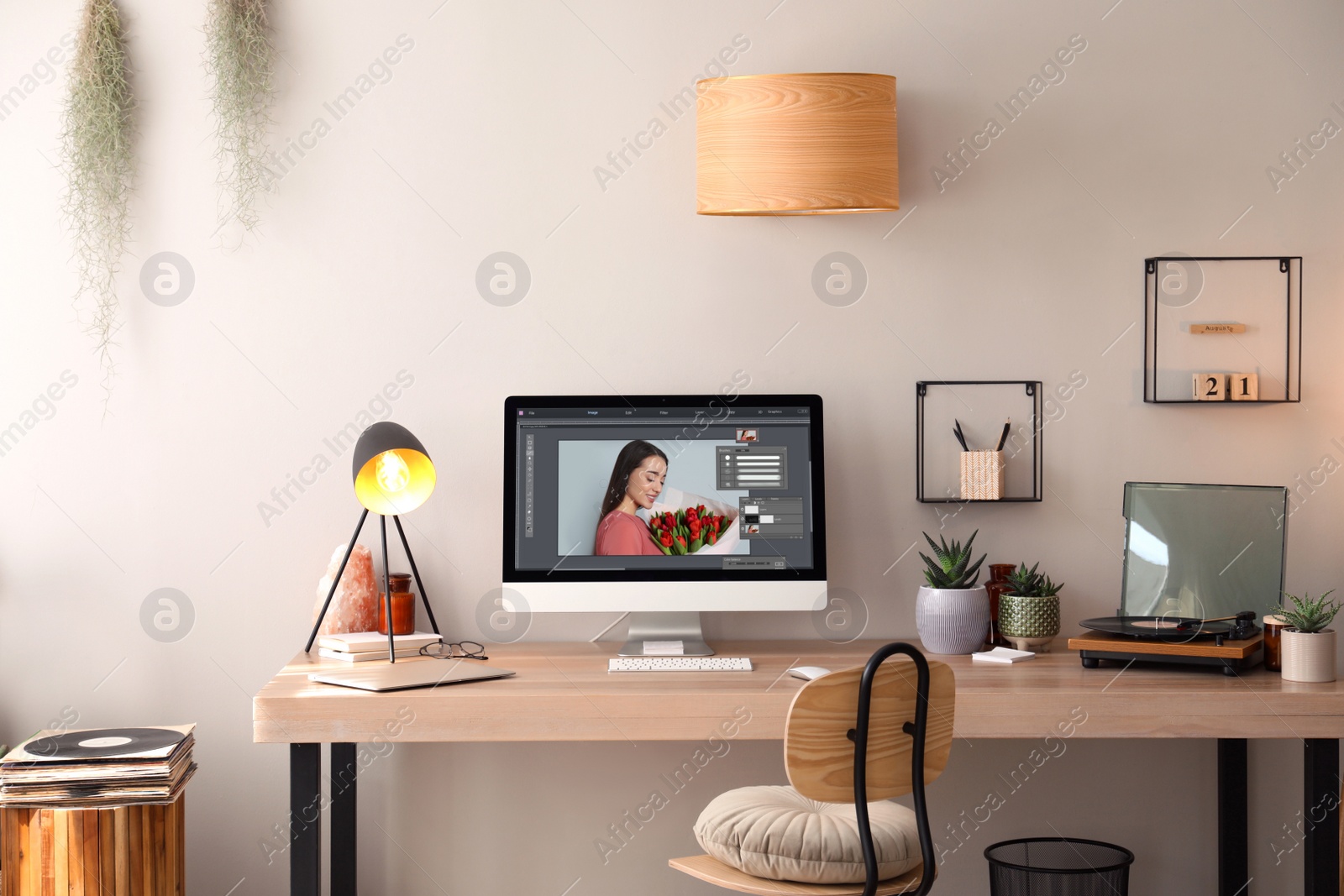 Image of Designer's workplace. Computer with photo editor application on table indoors