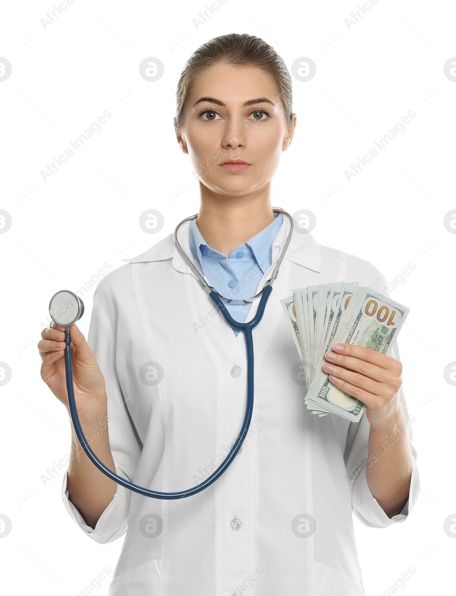 Photo of Doctor with bribe on white background. Corruption in medicine