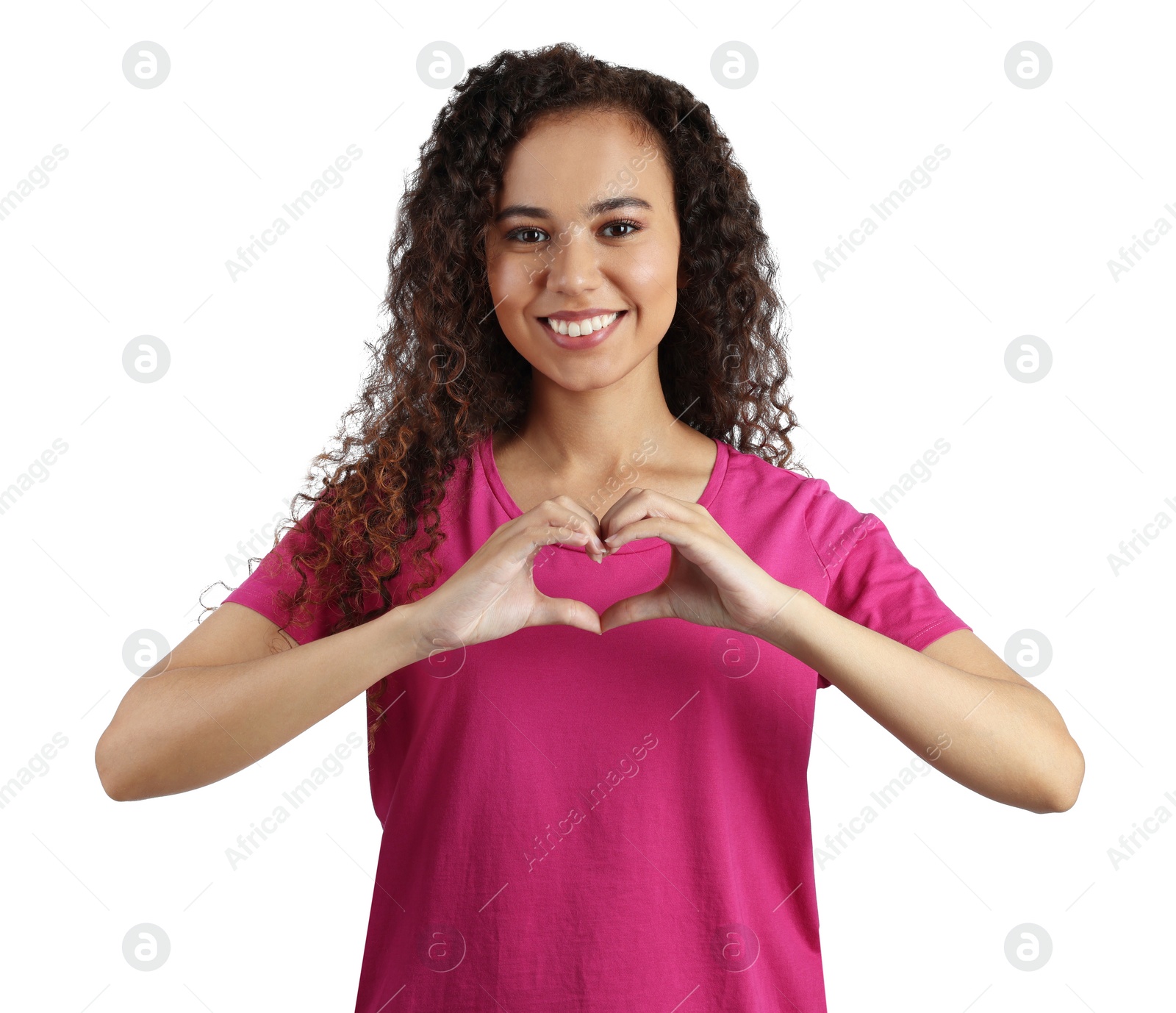 Photo of Happy young African-American woman making heart with hands on white background