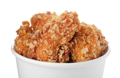 Photo of Bucket with yummy fried nuggets on white background, closeup