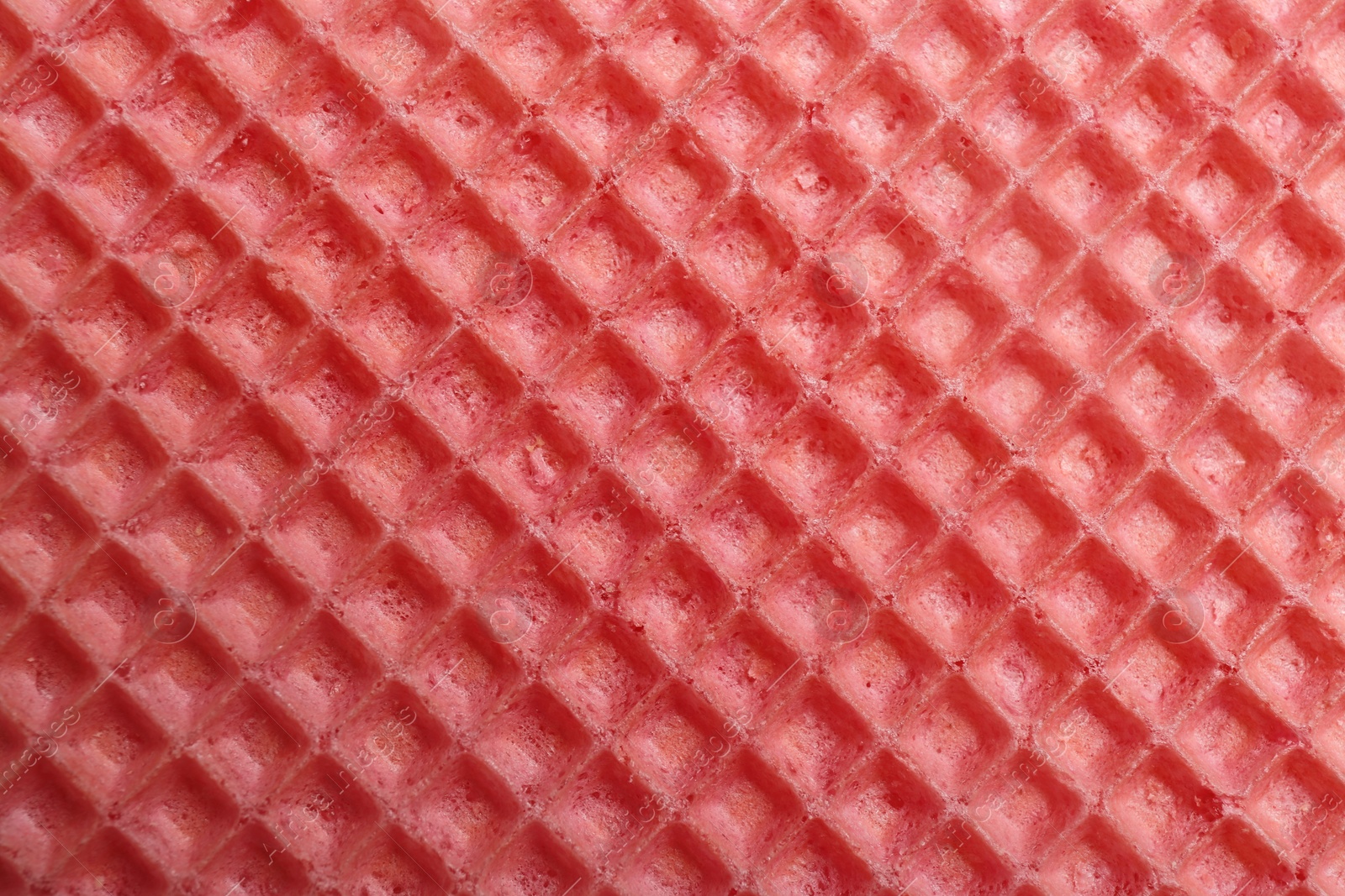 Photo of Tasty wafer as background, closeup. Crispy food