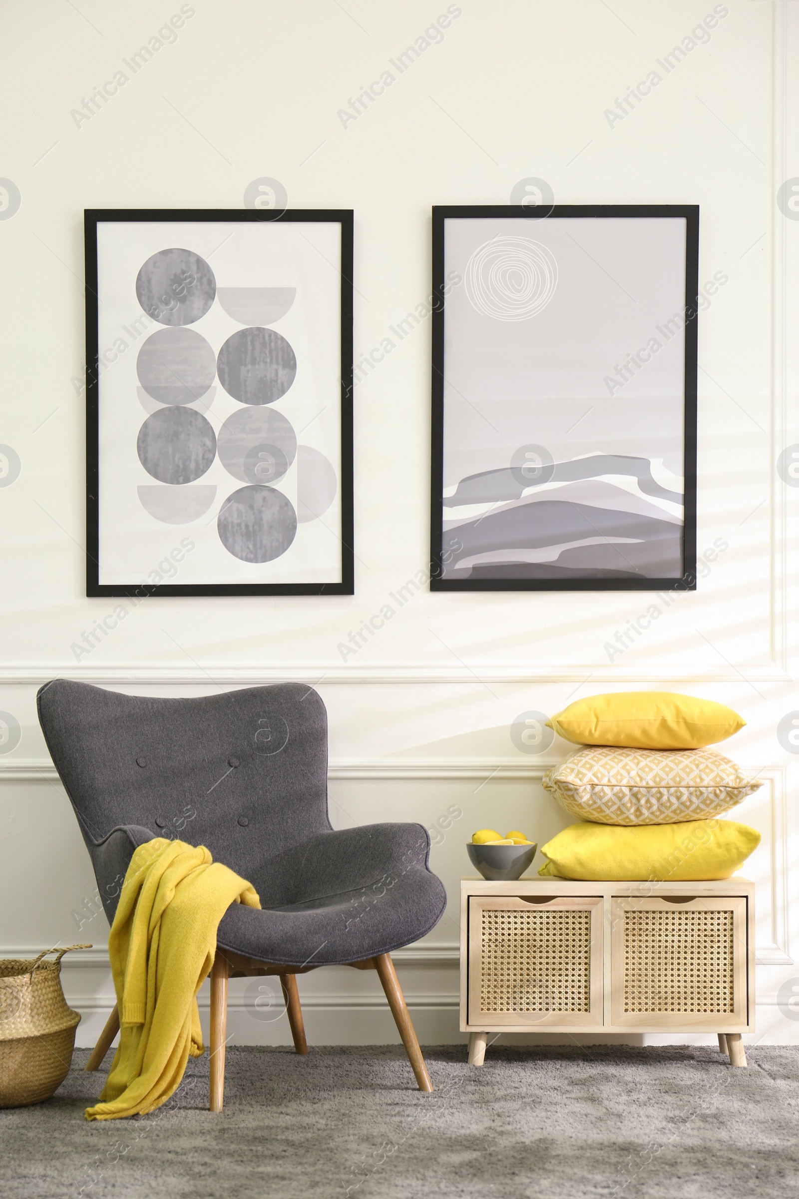 Photo of Stylish living room with armchair. Interior design in grey and yellow colors