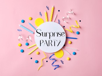 Flat lay composition with different items for surprise party on pink background