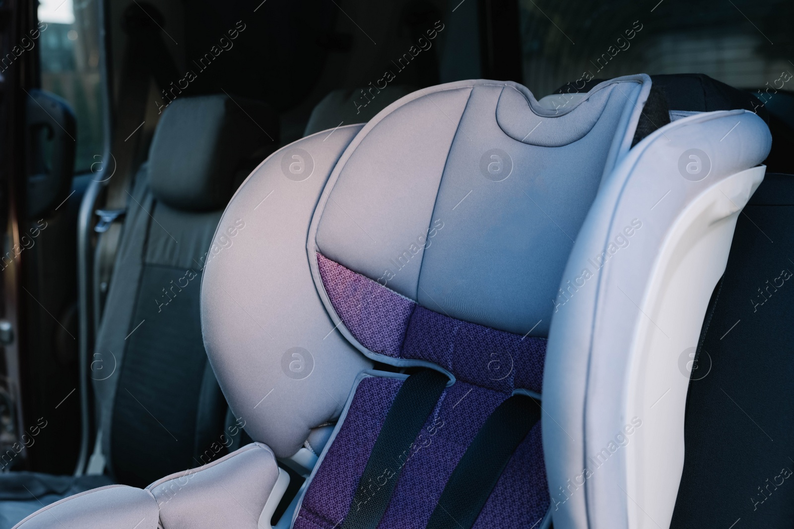 Photo of Empty modern child safety seat inside car