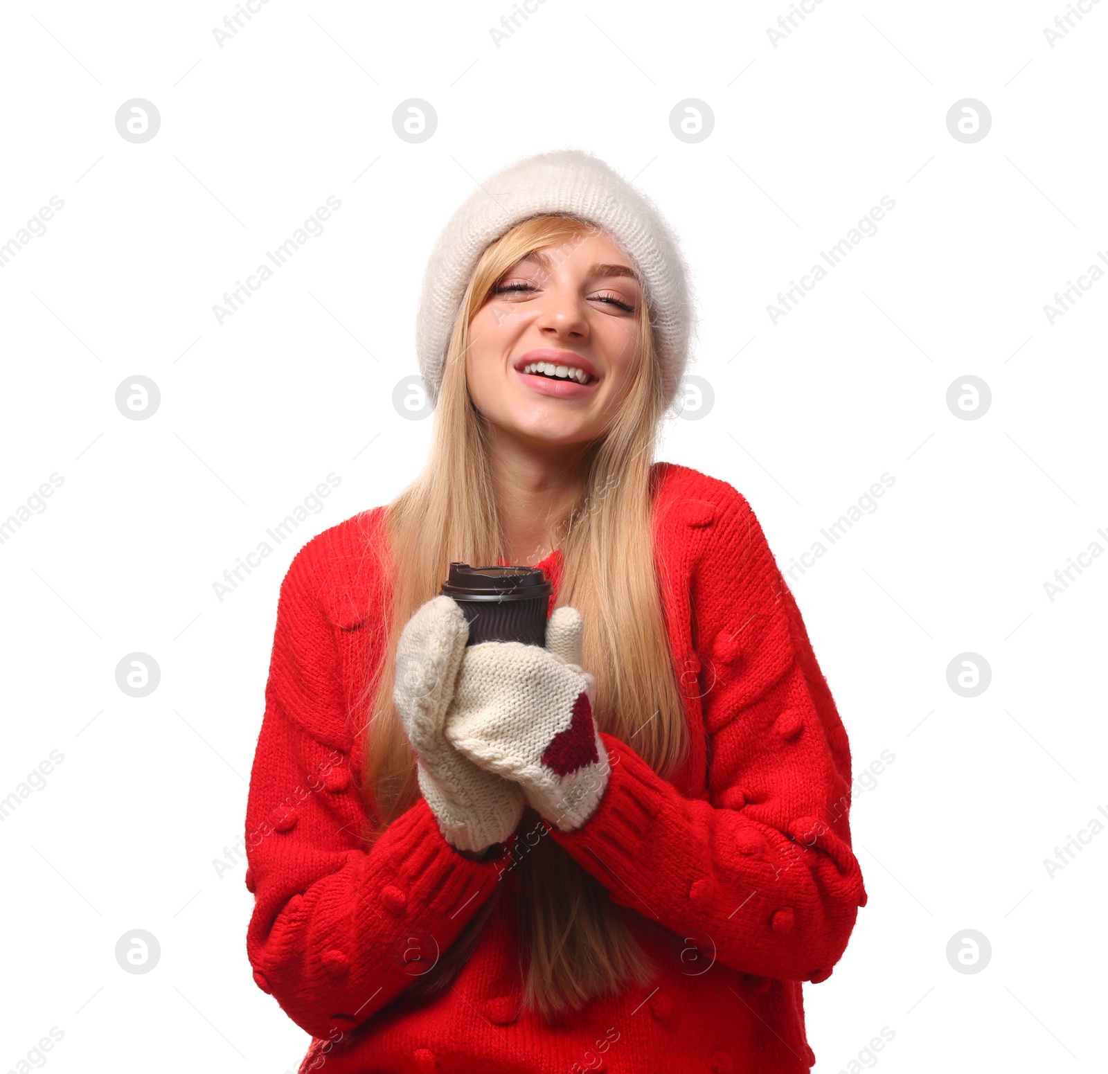 Photo of Portrait of young woman in stylish hat and sweater with paper coffee cup on white background. Winter atmosphere