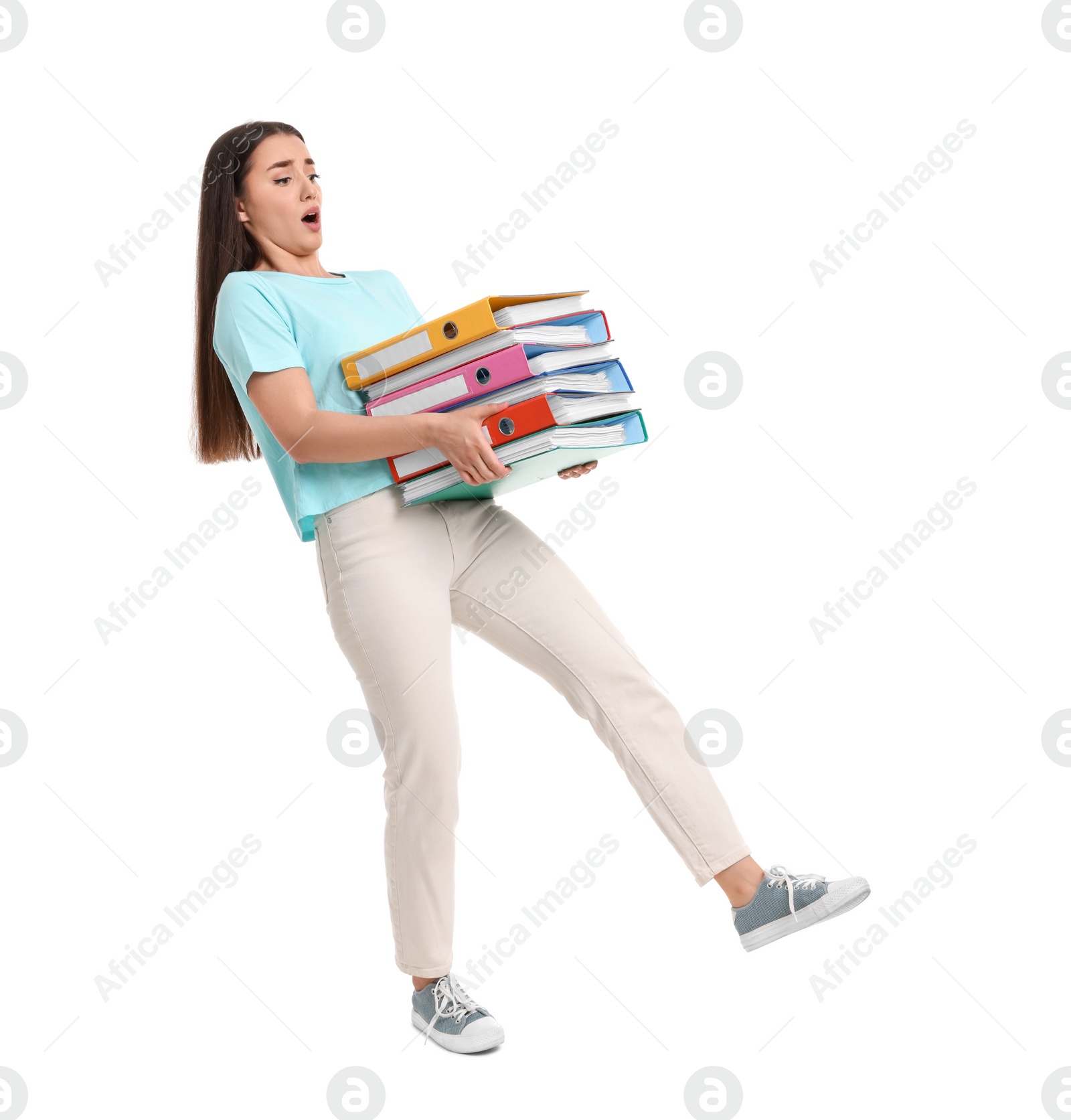 Photo of Stressful woman with folders walking on white background