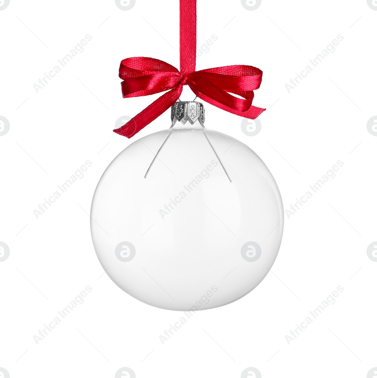 Photo of Transparent glass Christmas ball with red ribbon and bow isolated on white