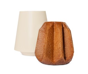Photo of Delicious Pandoro cake and box on white background. Traditional Italian pastry