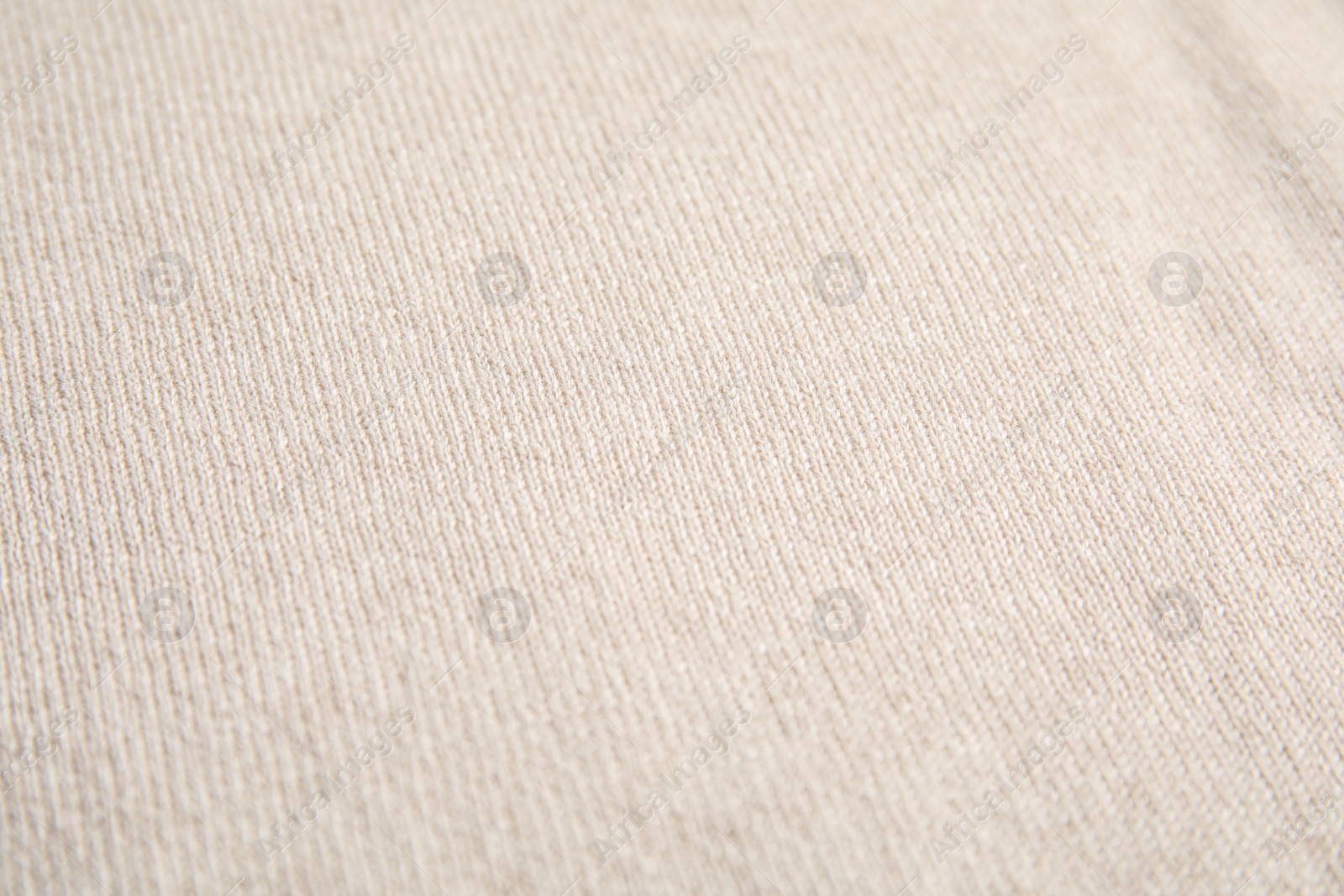 Photo of Warm cashmere sweater as background, top view