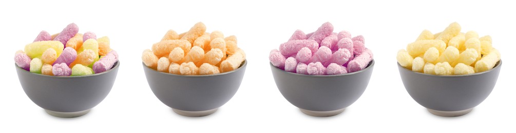 Image of Set of bowls with colorful corn puffs on white background