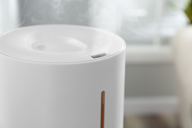 Modern air humidifier at home, closeup view