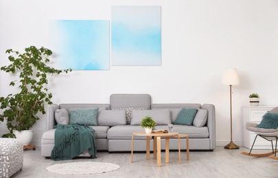 Photo of Modern living room interior with comfortable sofa