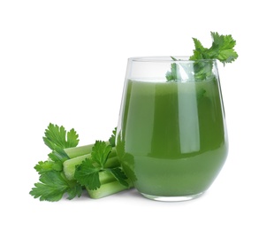 Glass of fresh juice and celery on white background