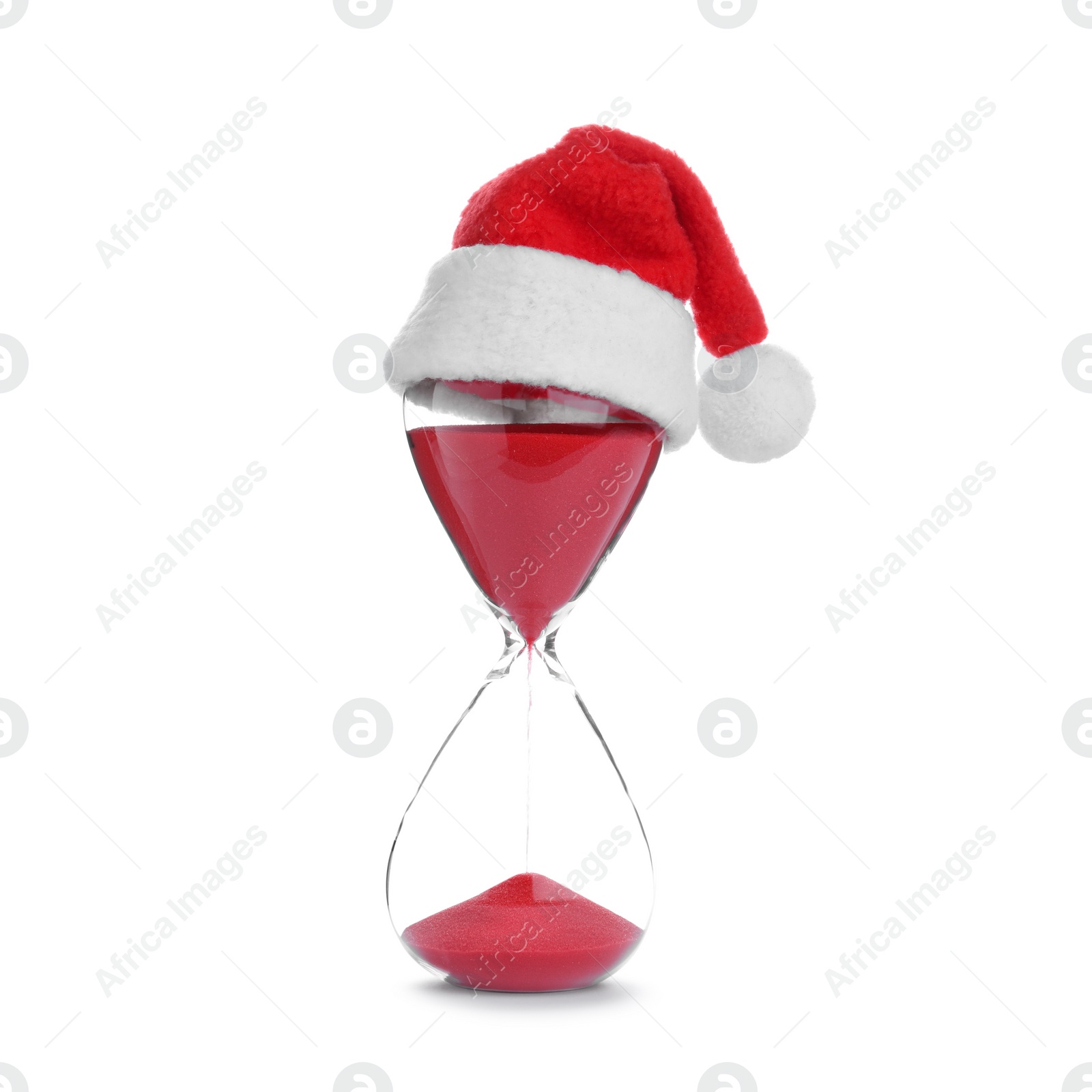 Photo of Hourglass and Santa hat isolated on white. Christmas countdown