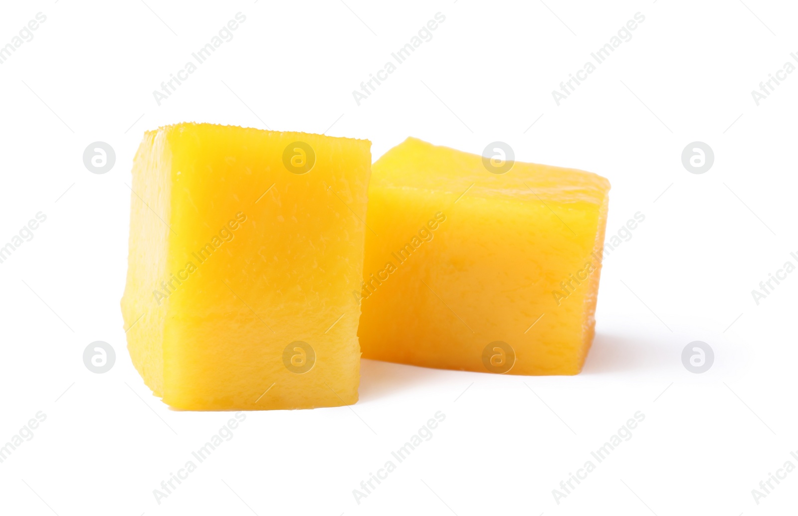 Photo of Fresh juicy mango cubes isolated on white