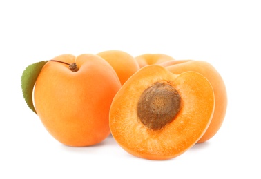 Photo of Delicious ripe sweet apricots isolated on white