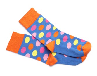 Photo of Pair of new socks with pattern on white background, top view