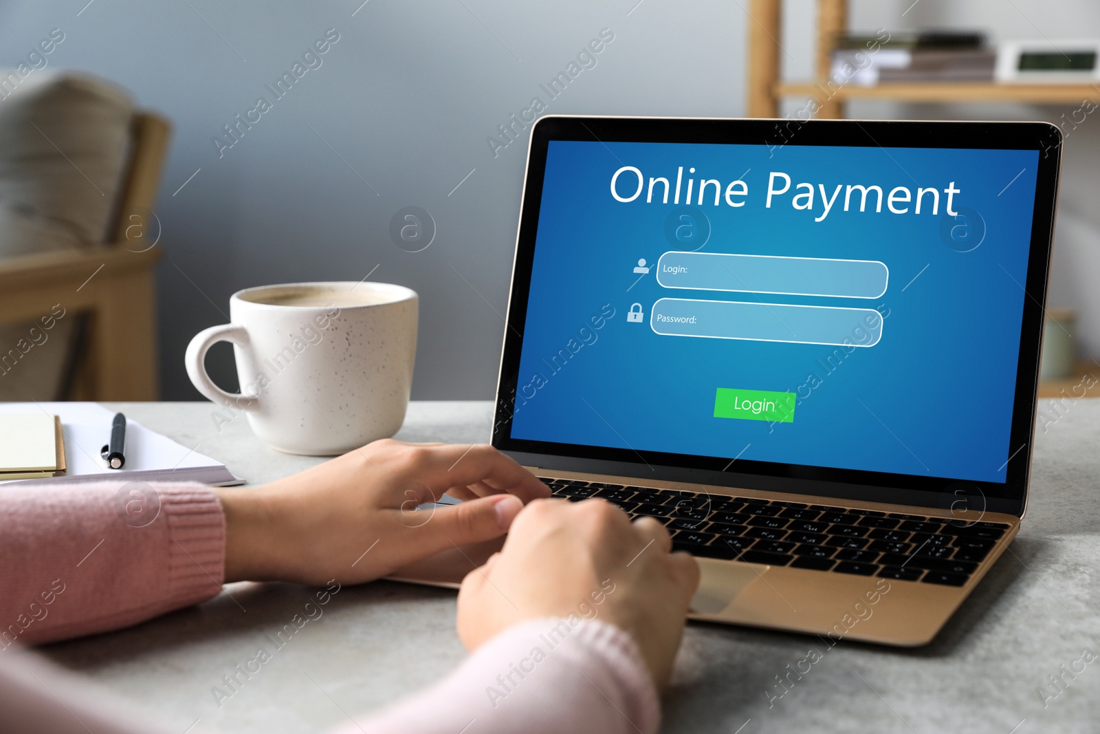 Image of Woman using laptop for online payment at table, closeup