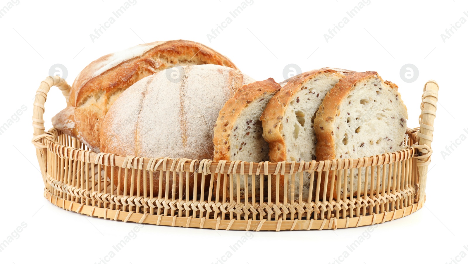 Photo of Wicker basket with different types of fresh bread isolated on white