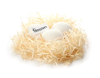 Eggs and card with word PENSION in nest on white background