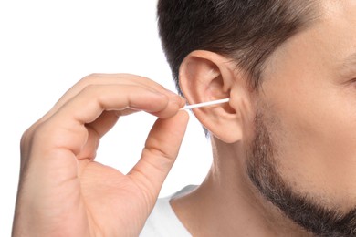 Photo of Man cleaning ears on white background, closeup