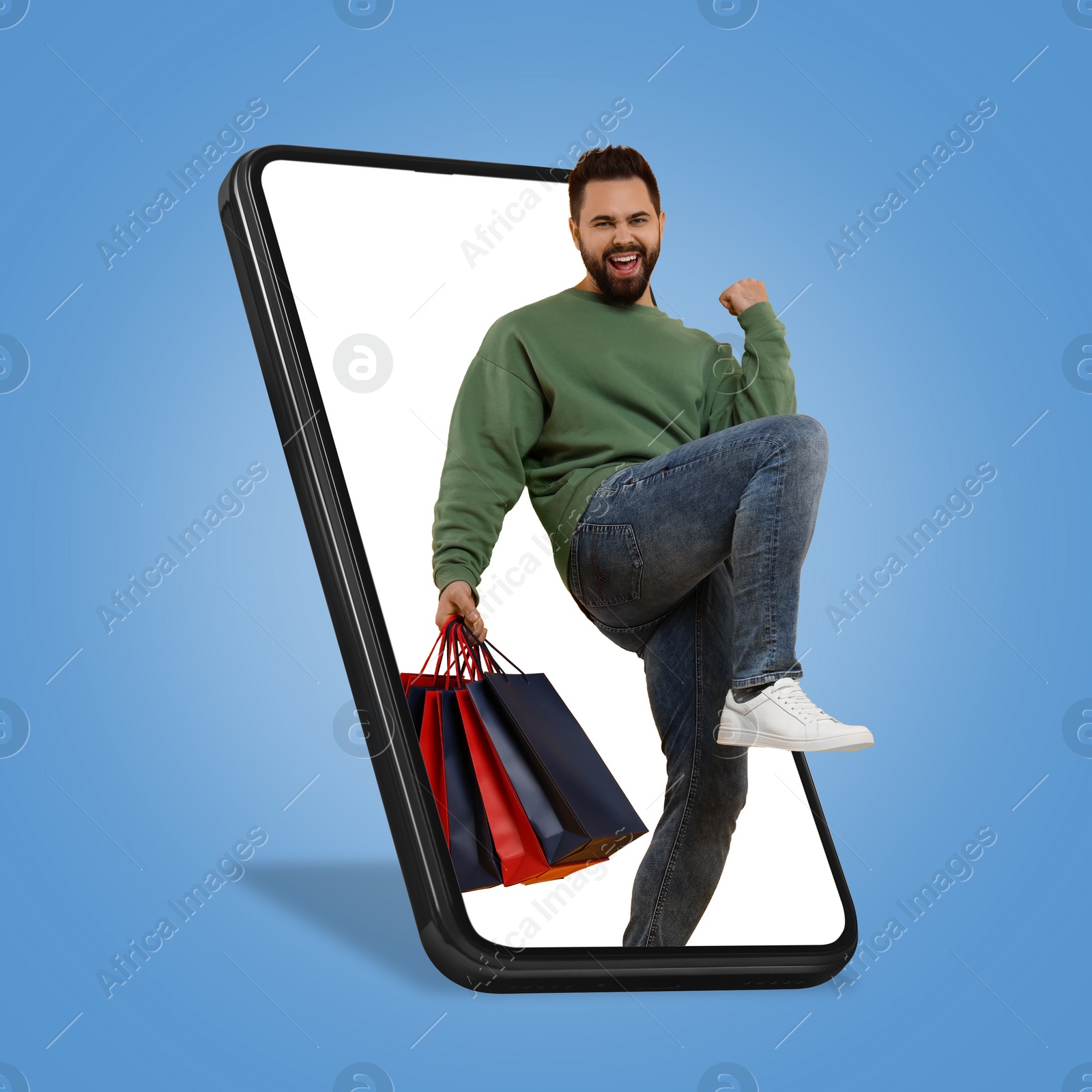 Image of Online shopping. Happy man with paper bags walking out from smartphone on light blue background