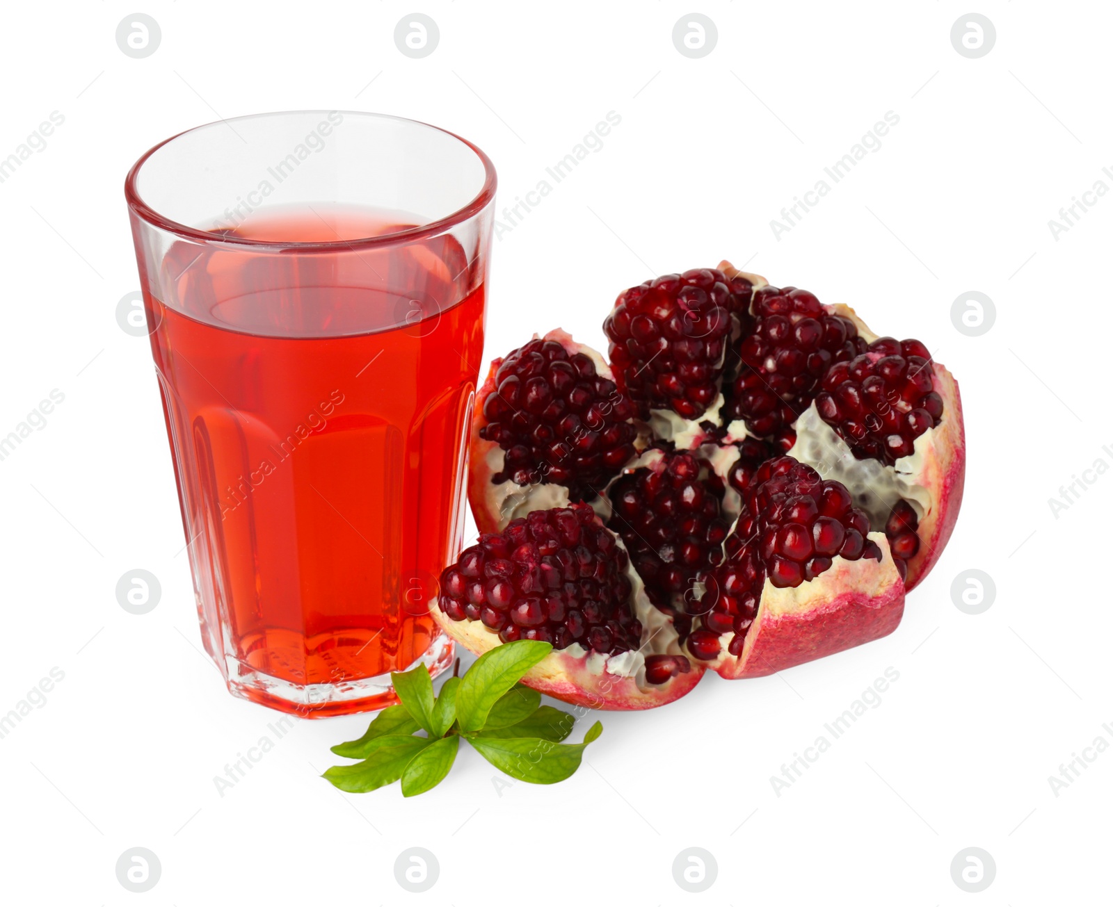Photo of Refreshing pomegranate juice in glass, leaves and fruit isolated on white