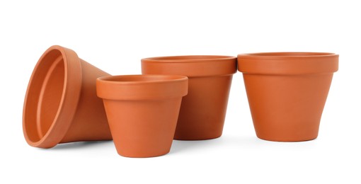 Empty clay flower pots isolated on white