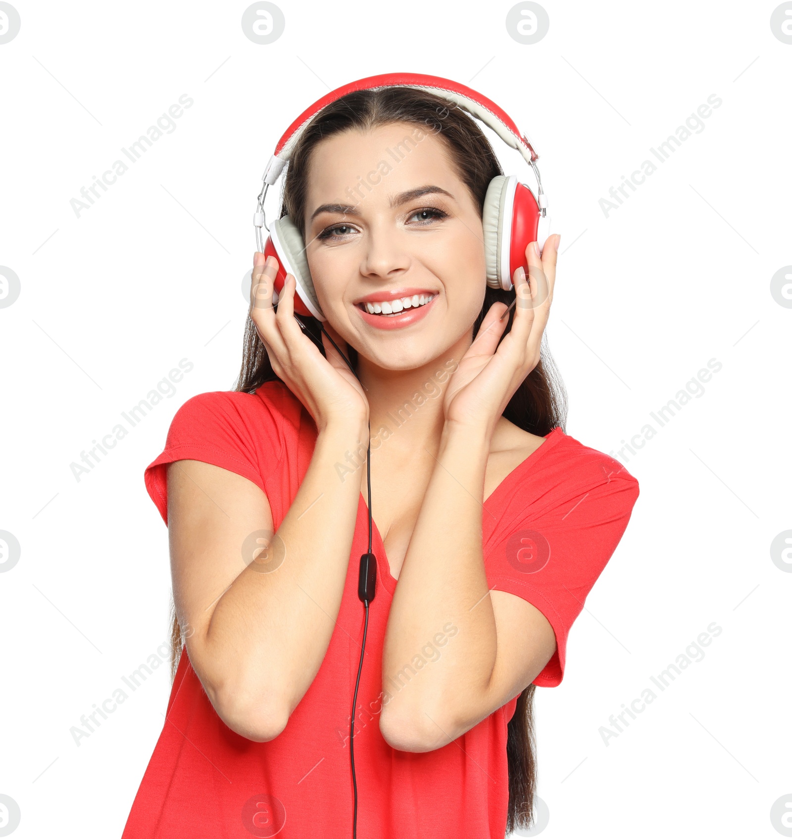 Photo of Young woman listening to Christmas music on white background