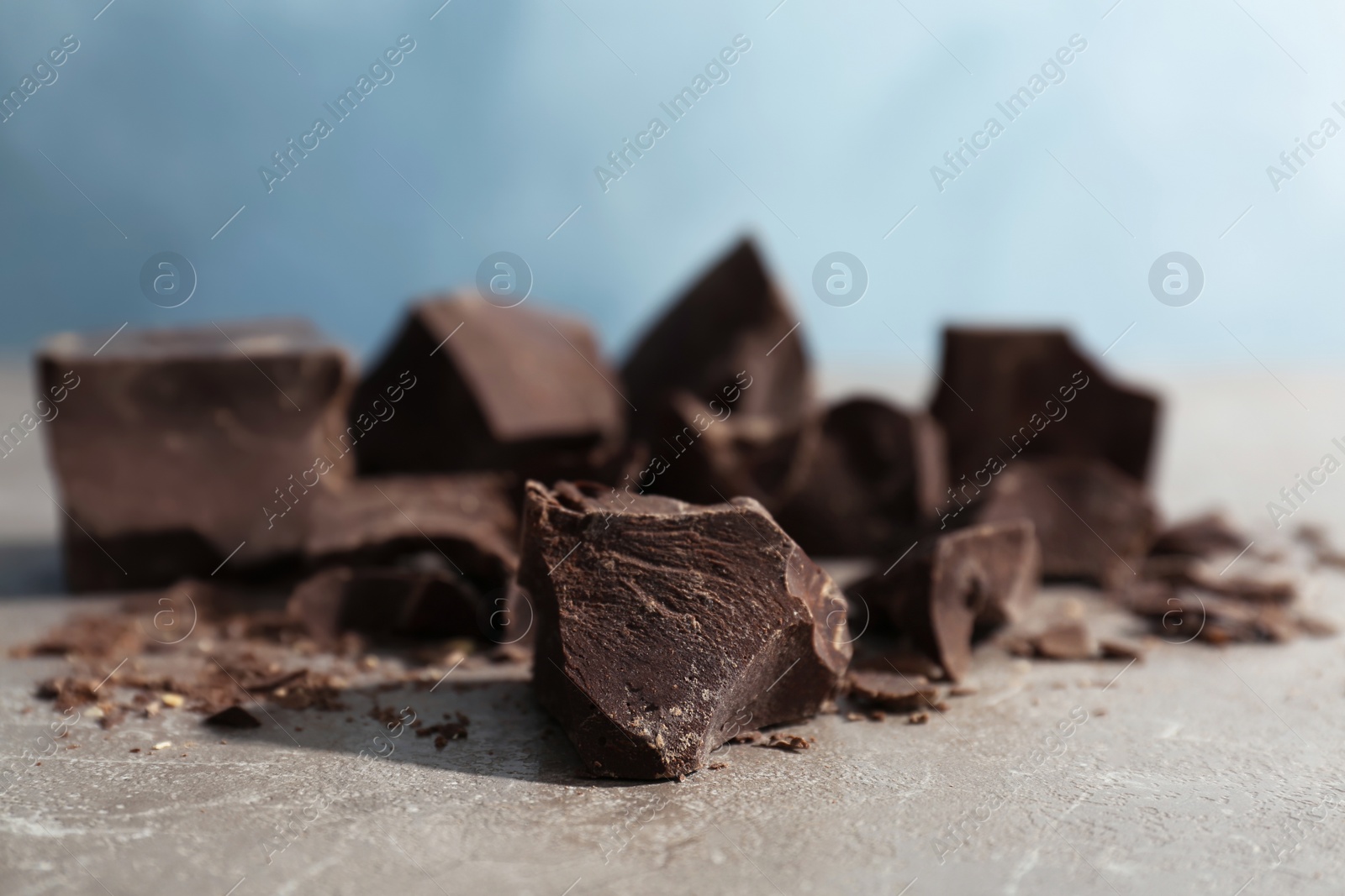 Photo of Delicious dark chocolate on table, closeup