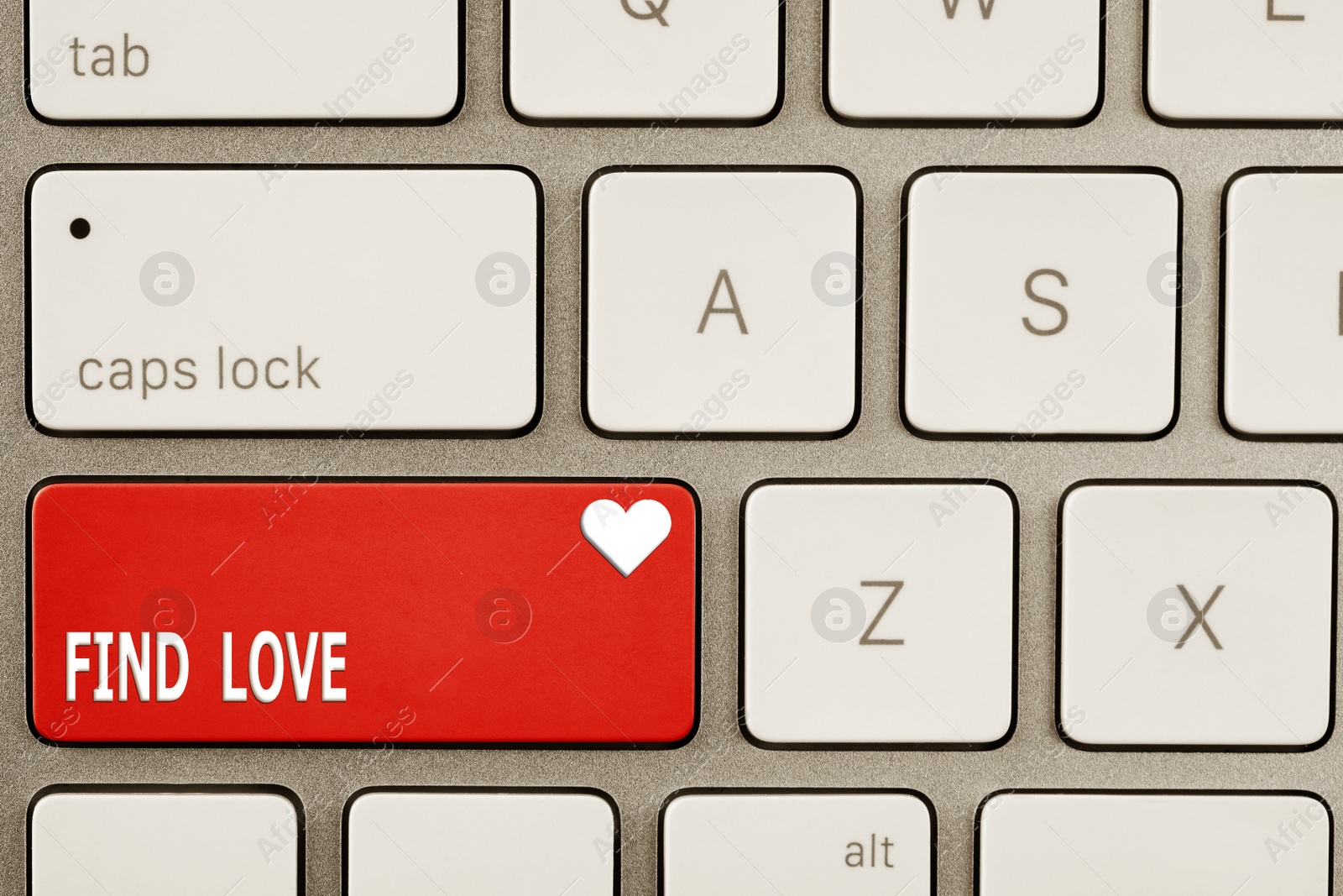 Image of Online dating. Red button with words Find Love on computer keyboard, top view