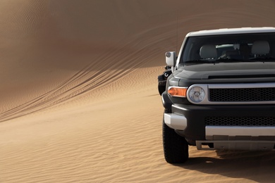 Photo of Modern car in desert ready for dune bashing