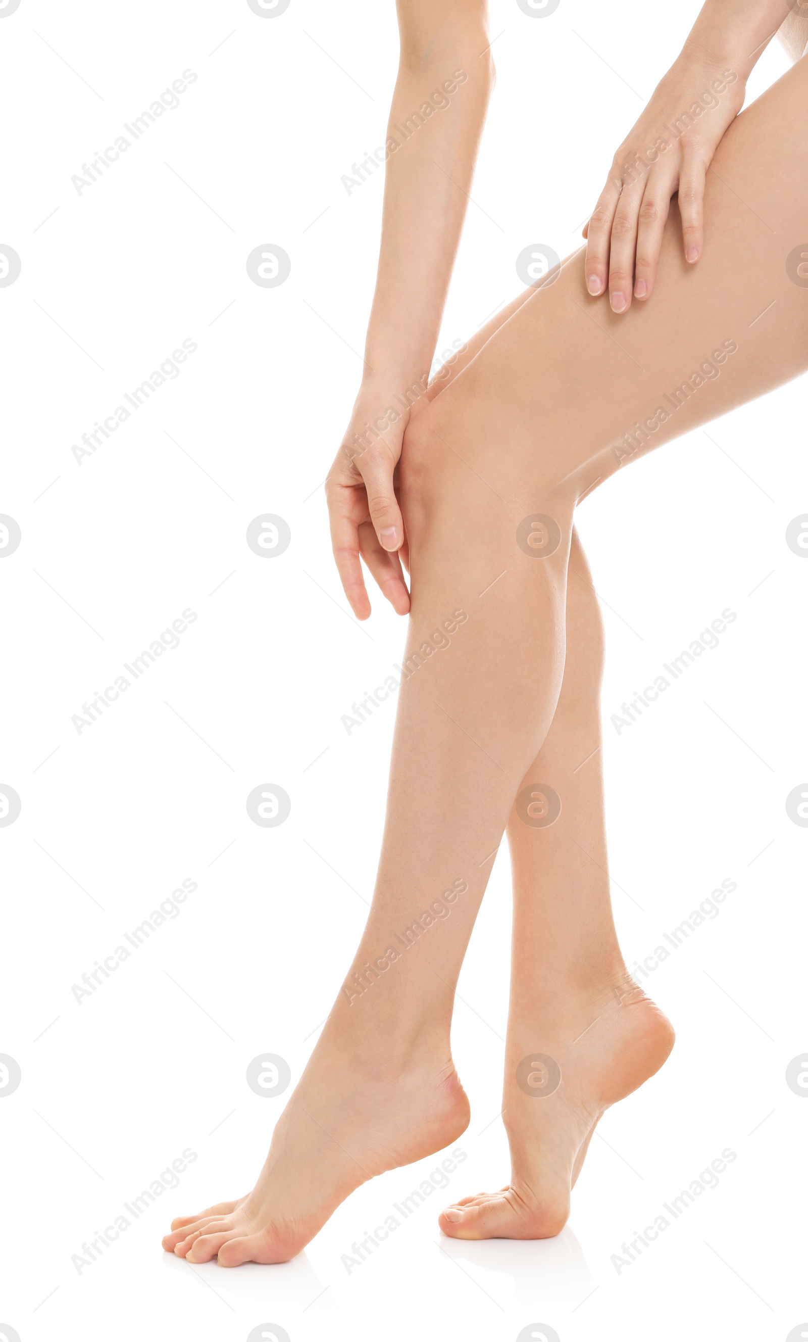 Photo of Young woman showing smooth silky skin after epilation on white background