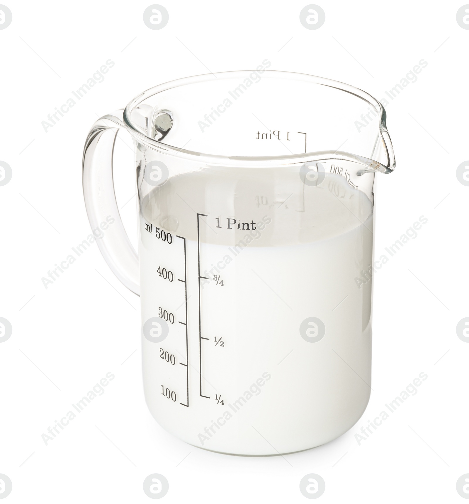 Photo of Fresh milk in measuring cup isolated on white